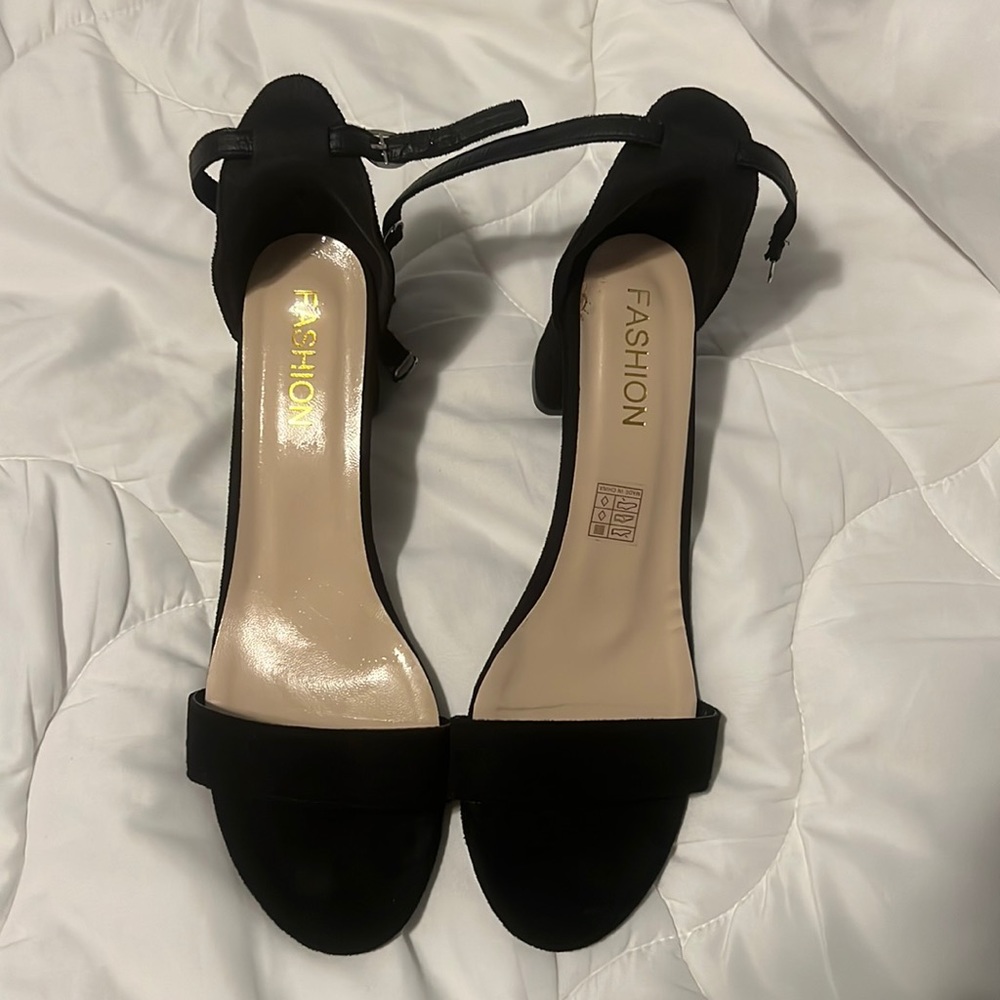 Size 42 (9.5). Been worn once. Black. Ankle strap.